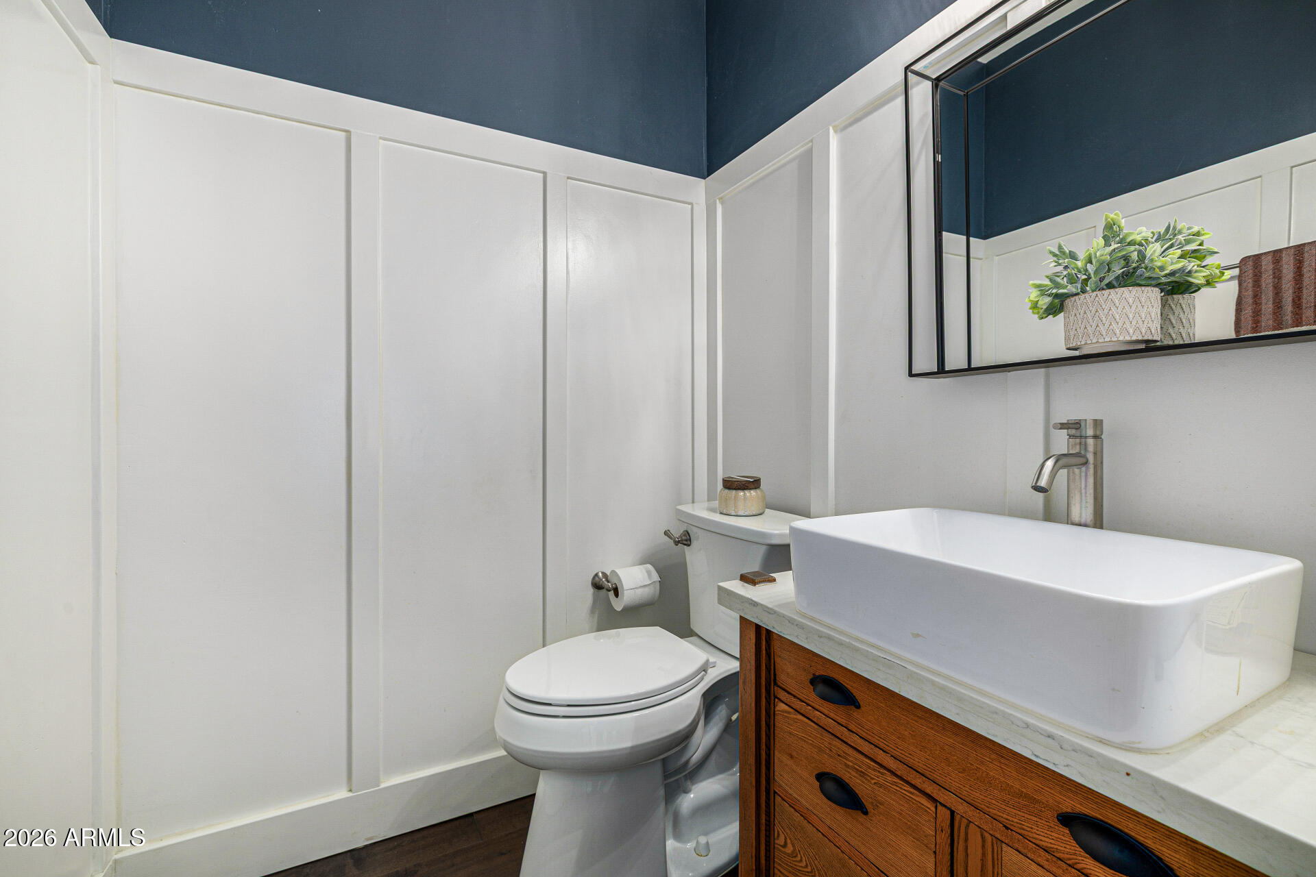 2187 East Finley Street Gilbert, AZ 85296 - Photo 34 of 89 a bathroom with a sink a toilet and mirror