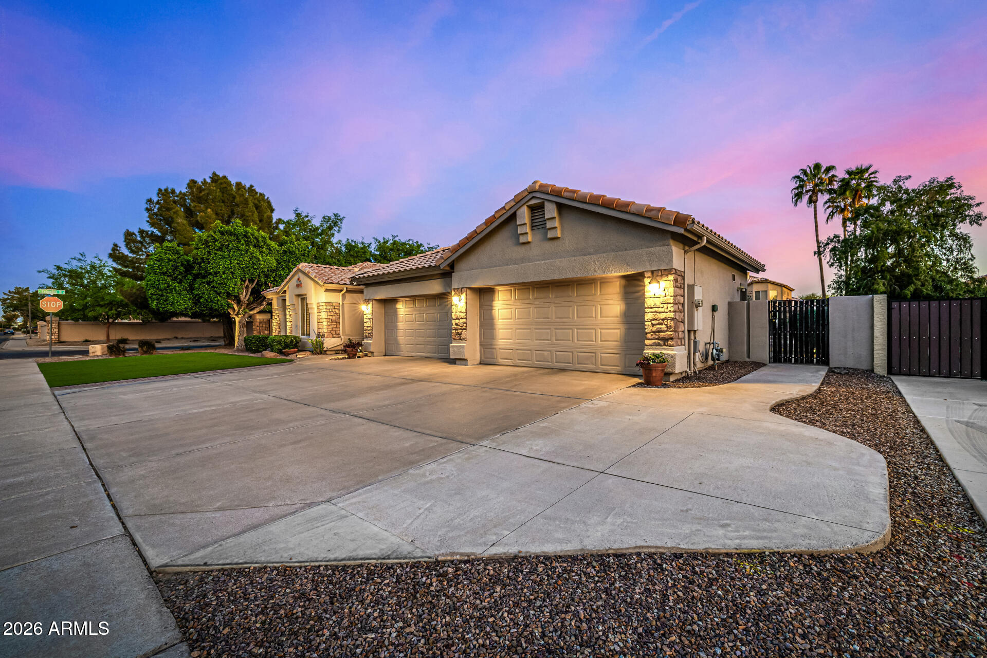 2187 East Finley Street Gilbert, AZ 85296 - Photo 4 of 89 a front view of a house with a yard and garage