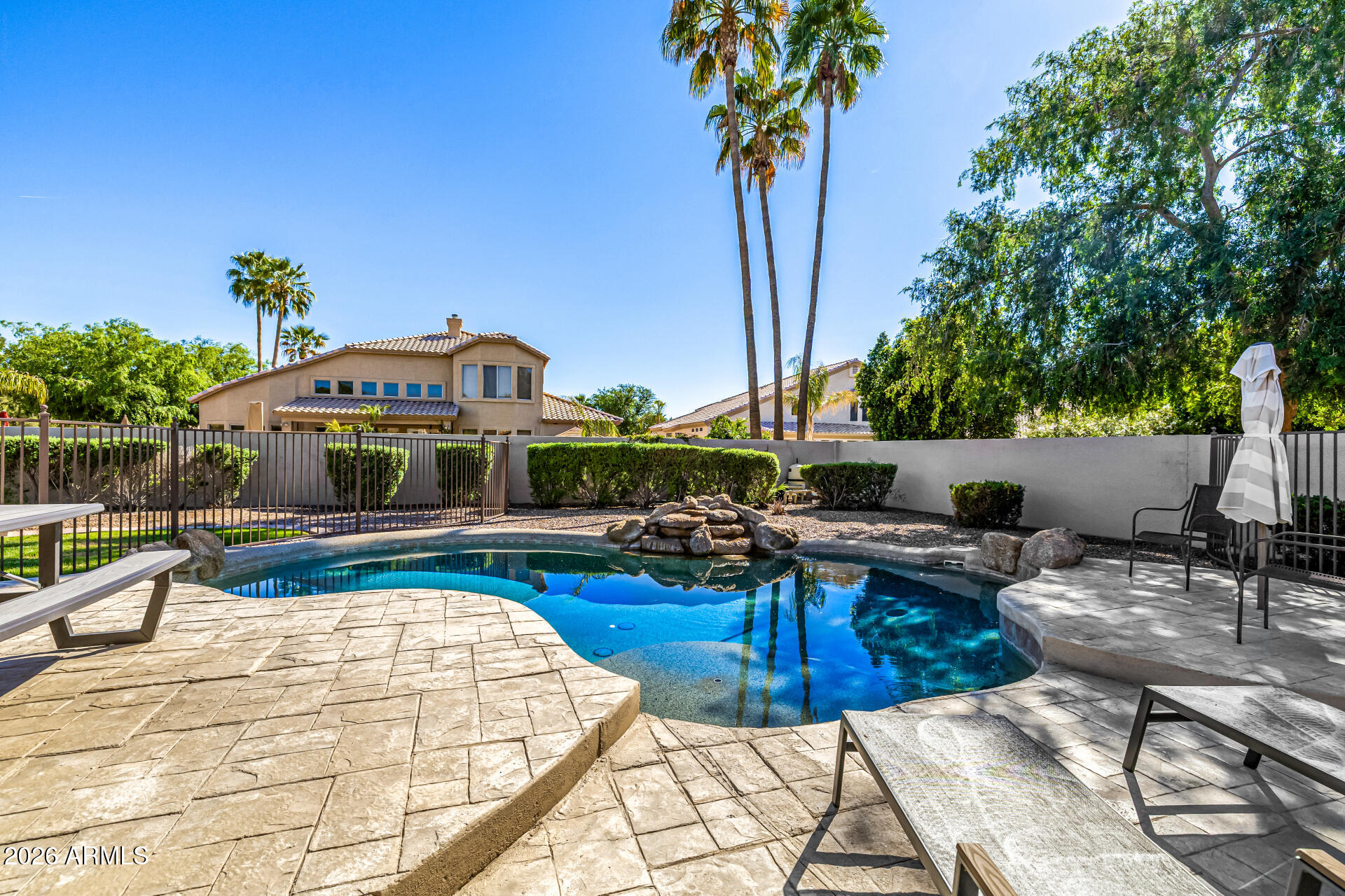2187 East Finley Street Gilbert, AZ 85296 - Photo 73 of 89 a view of swimming pool with outdoor seating and plants
