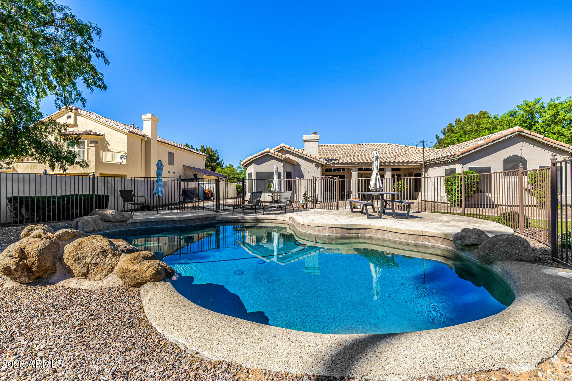 2187 East Finley Street Gilbert, AZ 85296 - Photo 75 of 89 a view of a house with swimming pool and sitting area