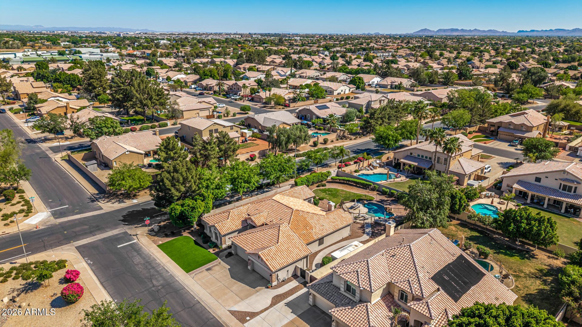 2187 East Finley Street Gilbert, AZ 85296 - Photo 78 of 89 an aerial view of residential houses with outdoor space and swimming pool