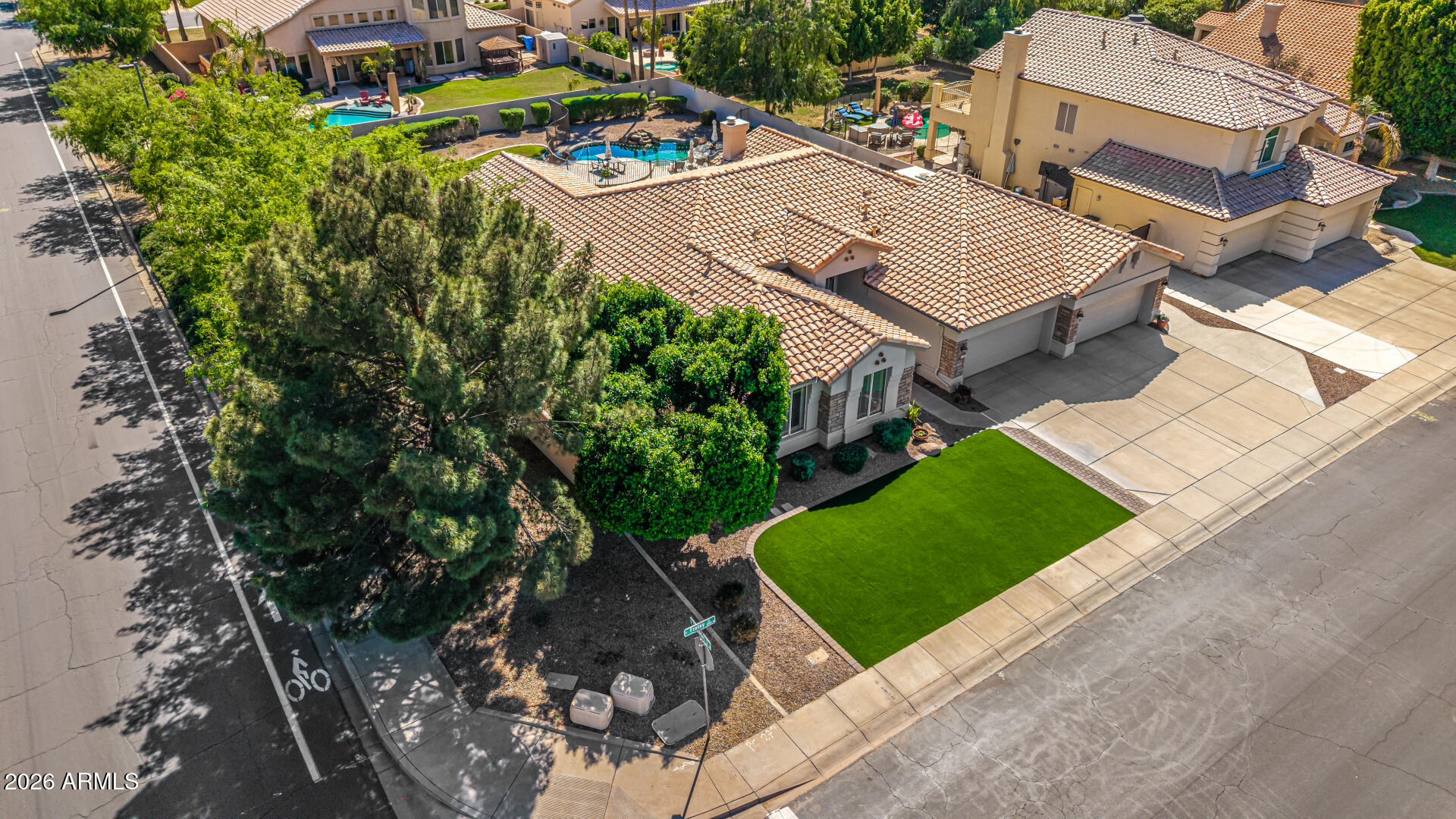 2187 East Finley Street Gilbert, AZ 85296 - Photo 80 of 89 an aerial view of a house with a garden and trees