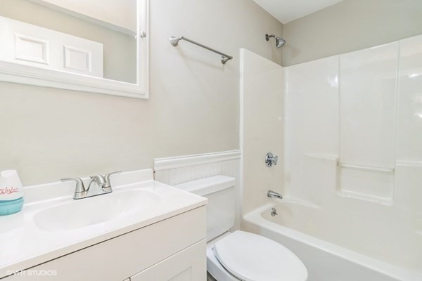 859 Pleasant Street Canton, MA 02021 - Photo 6 of 14 a bathroom with a sink toilet and shower