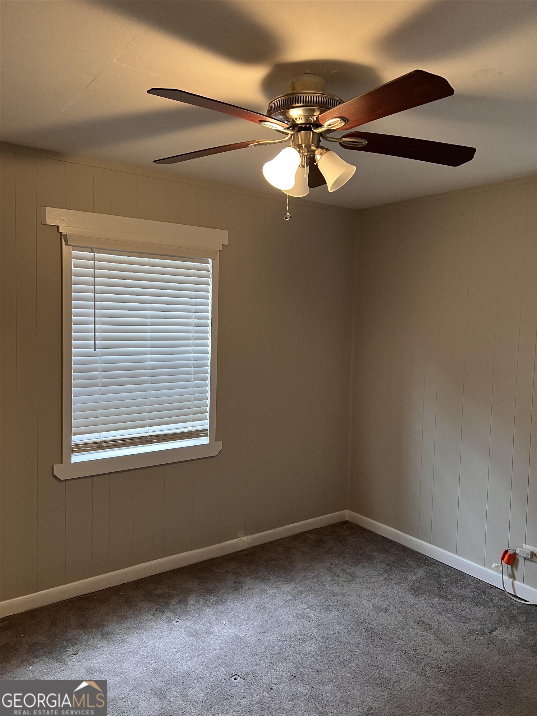 200 Willow Road, Unit 2C Peachtree City, GA 30269 - Photo 6 of 14 a view of an empty room with a window