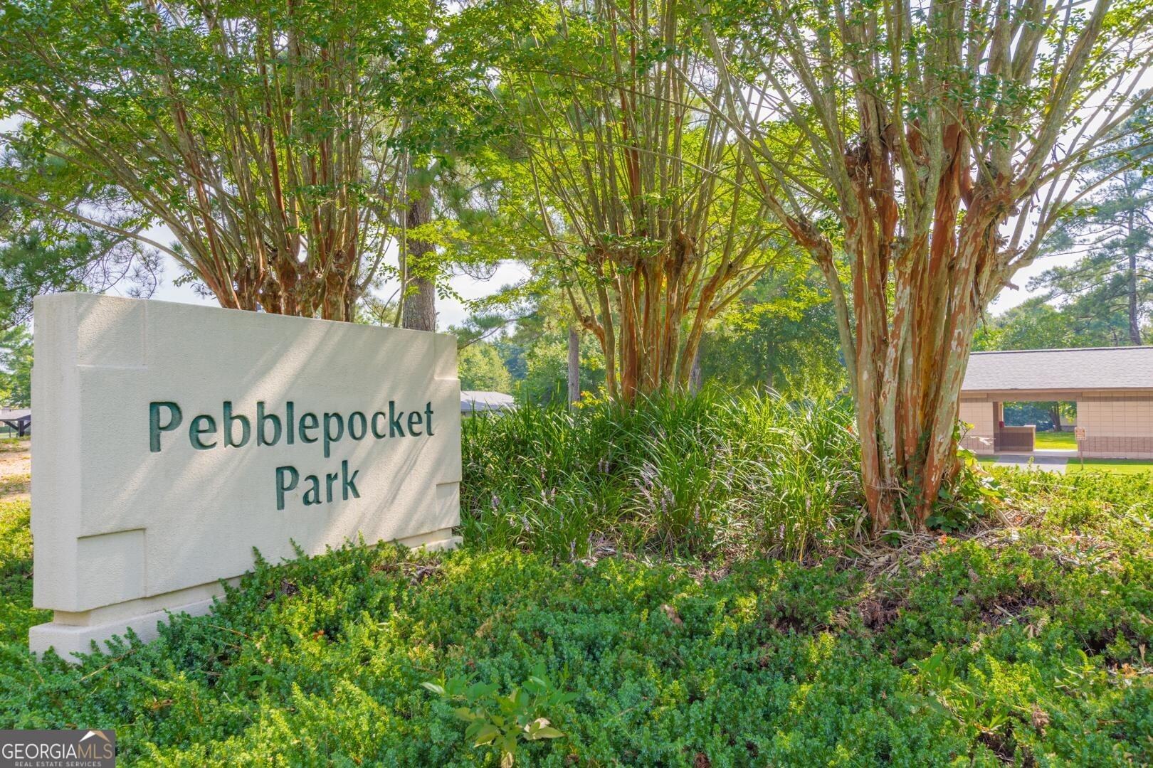 200 Willow Road, Unit 2C Peachtree City, GA 30269 - Photo 10 of 14 a sign on the side of a building