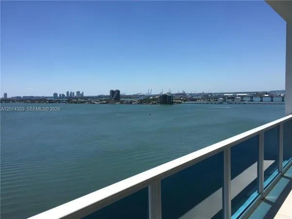 a view of a lake with a city view