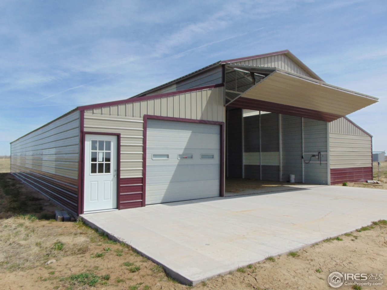 11 East Ranch Road Wiggins, CO 80654 - Photo 3 of 20 Barn w/bi-fold door