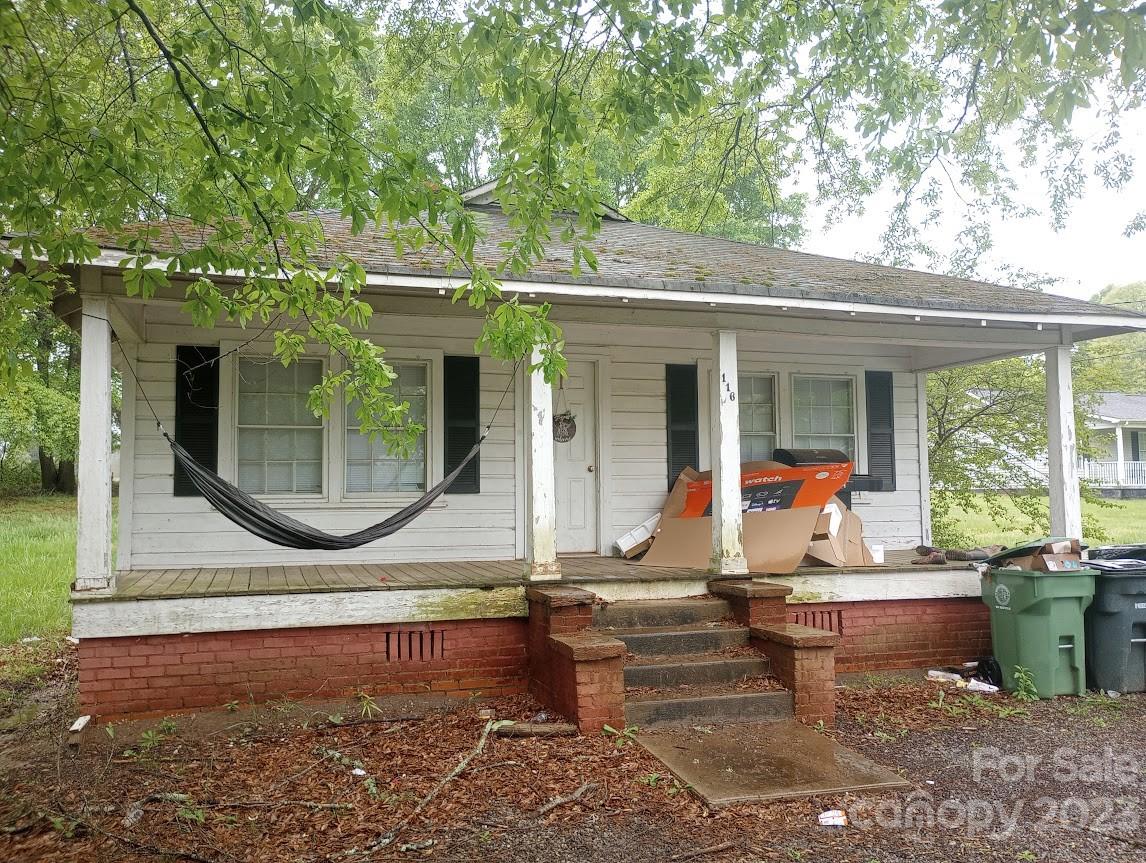 116 Flint Hill Church Road Boiling Springs, NC 28152 - Photo 1 of 18 a front view of a house with garden