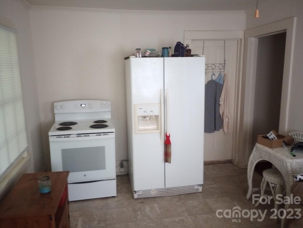 116 Flint Hill Church Road Boiling Springs, NC 28152 - Photo 15 of 18 a white refrigerator freezer sitting inside of a kitchen