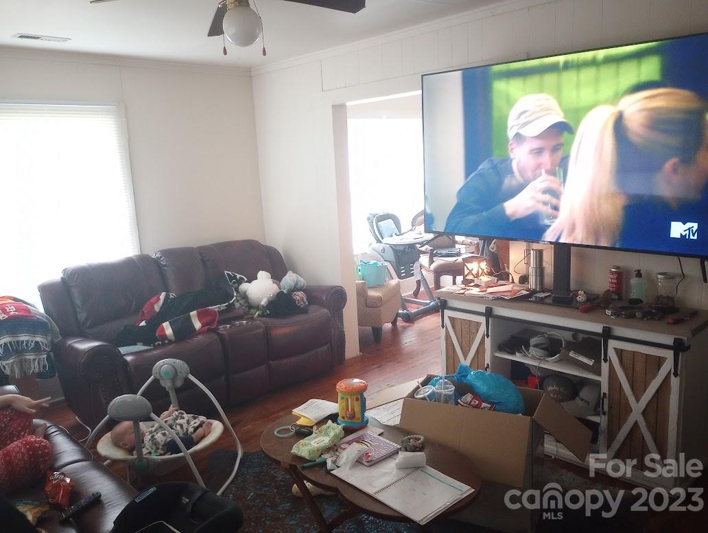 116 Flint Hill Church Road Boiling Springs, NC 28152 - Photo 8 of 18 a living room with furniture and a lamp