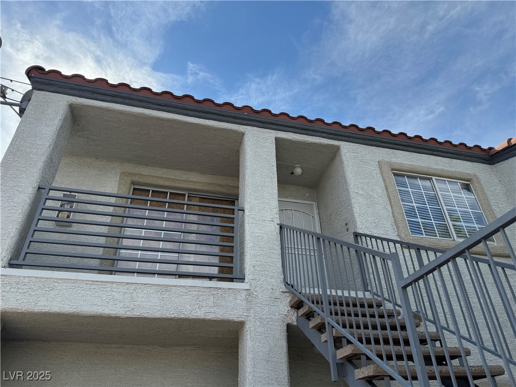 3318 North Decatur Boulevard, Unit 2057 Las Vegas, NV 89130 - Photo 1 of 18 View of property with stairway