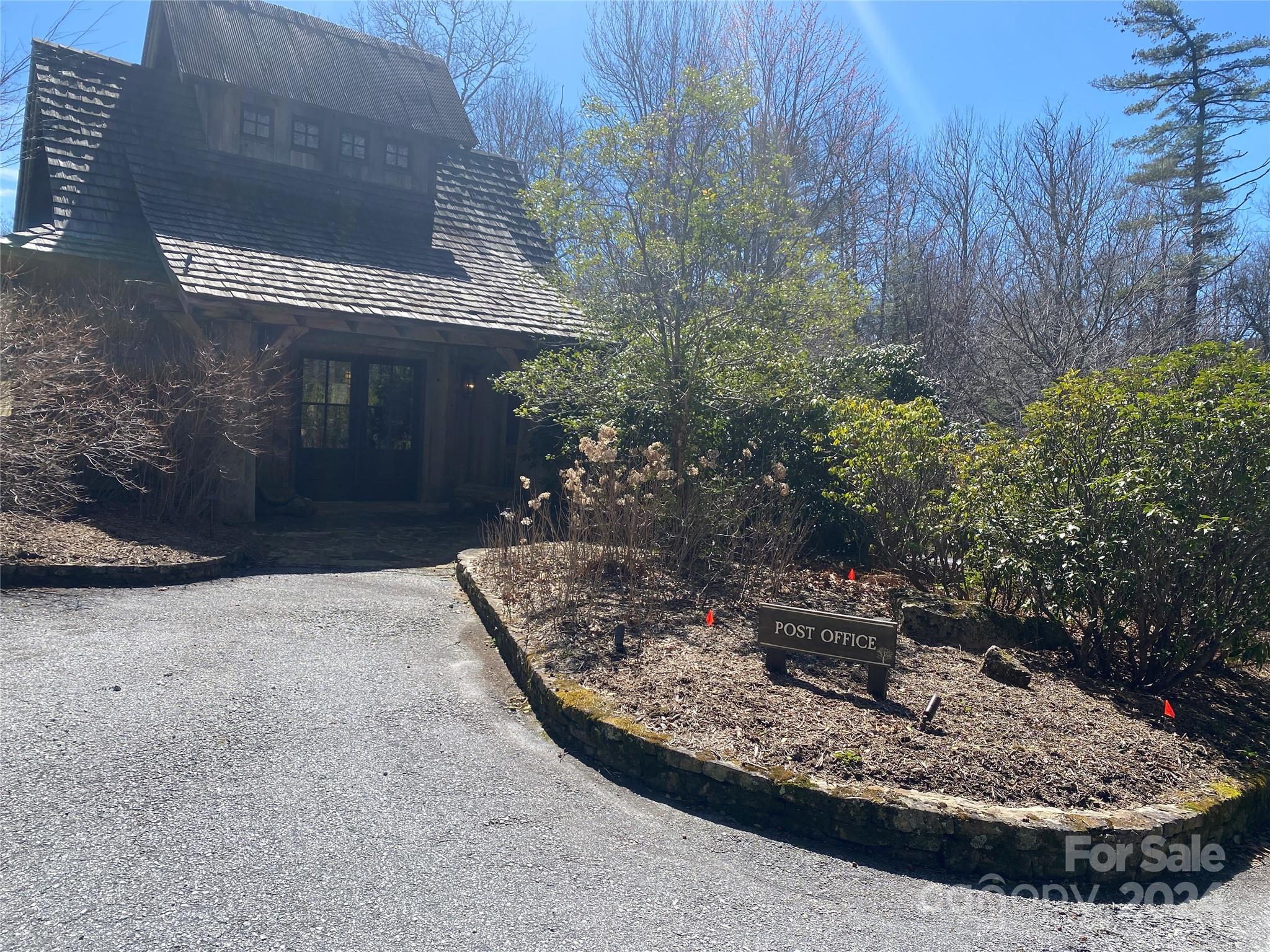 Lot C23 Roaming Road Glenville, NC 28736 - Photo 9 of 15 a view of a house with a yard