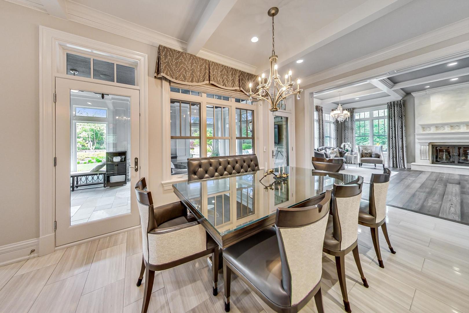 6679 Lee Court Burr Ridge, IL 60527 - Photo 18 of 98 a view of a dining room with furniture window and wooden floor