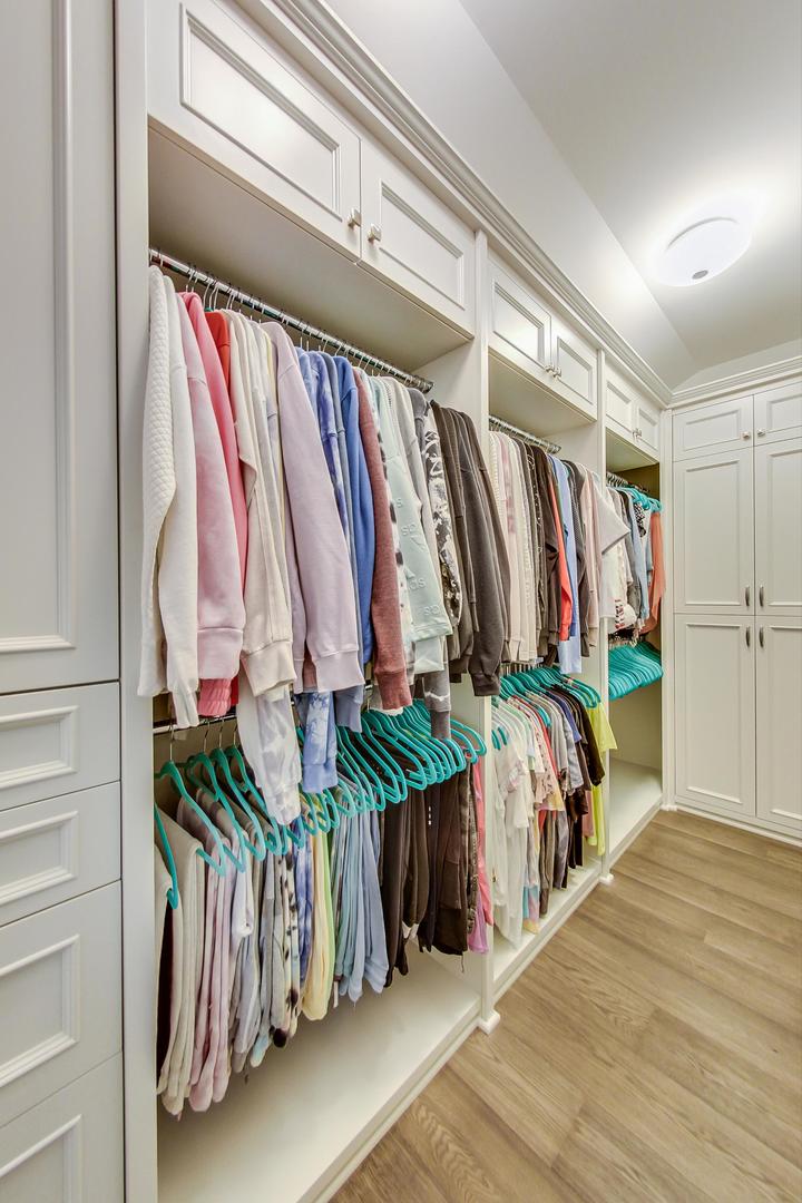 6679 Lee Court Burr Ridge, IL 60527 - Photo 44 of 98 a view of walk in closet with clothes