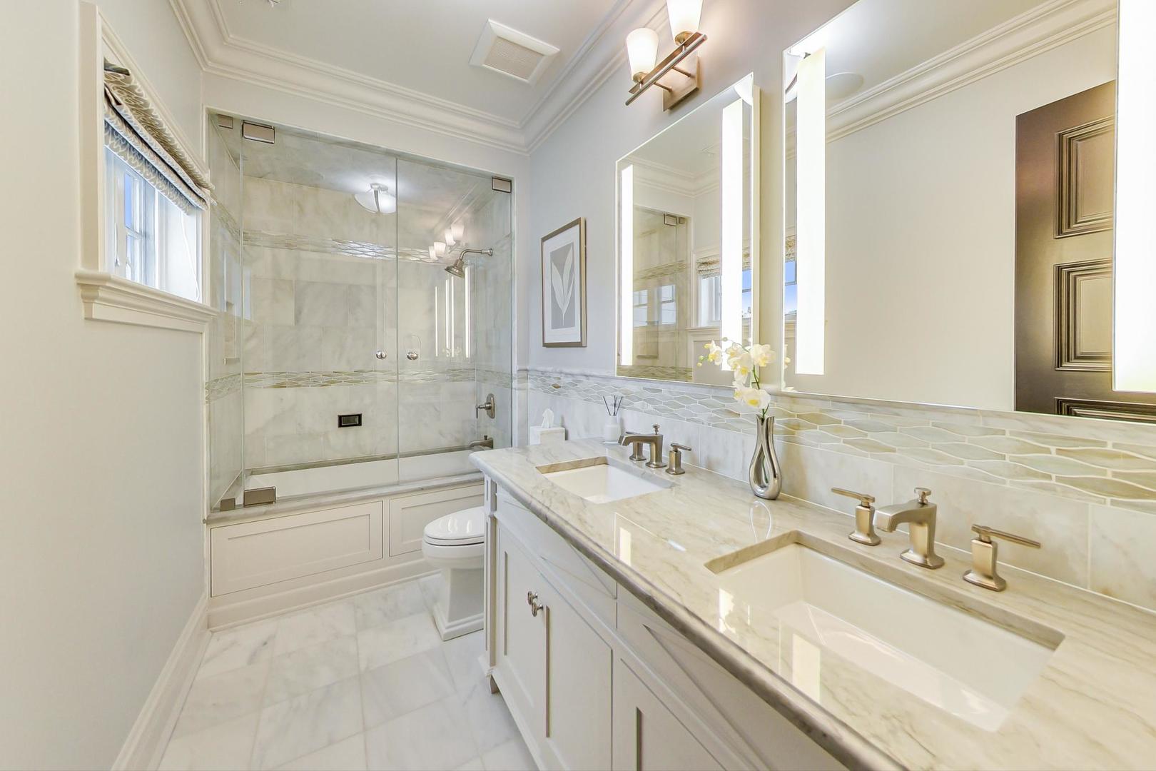 6679 Lee Court Burr Ridge, IL 60527 - Photo 53 of 98 a bathroom with a granite countertop sink toilet and shower