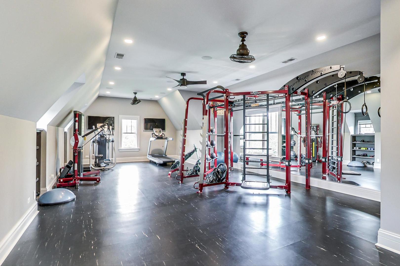 6679 Lee Court Burr Ridge, IL 60527 - Photo 54 of 98 a view of a room with gym equipment