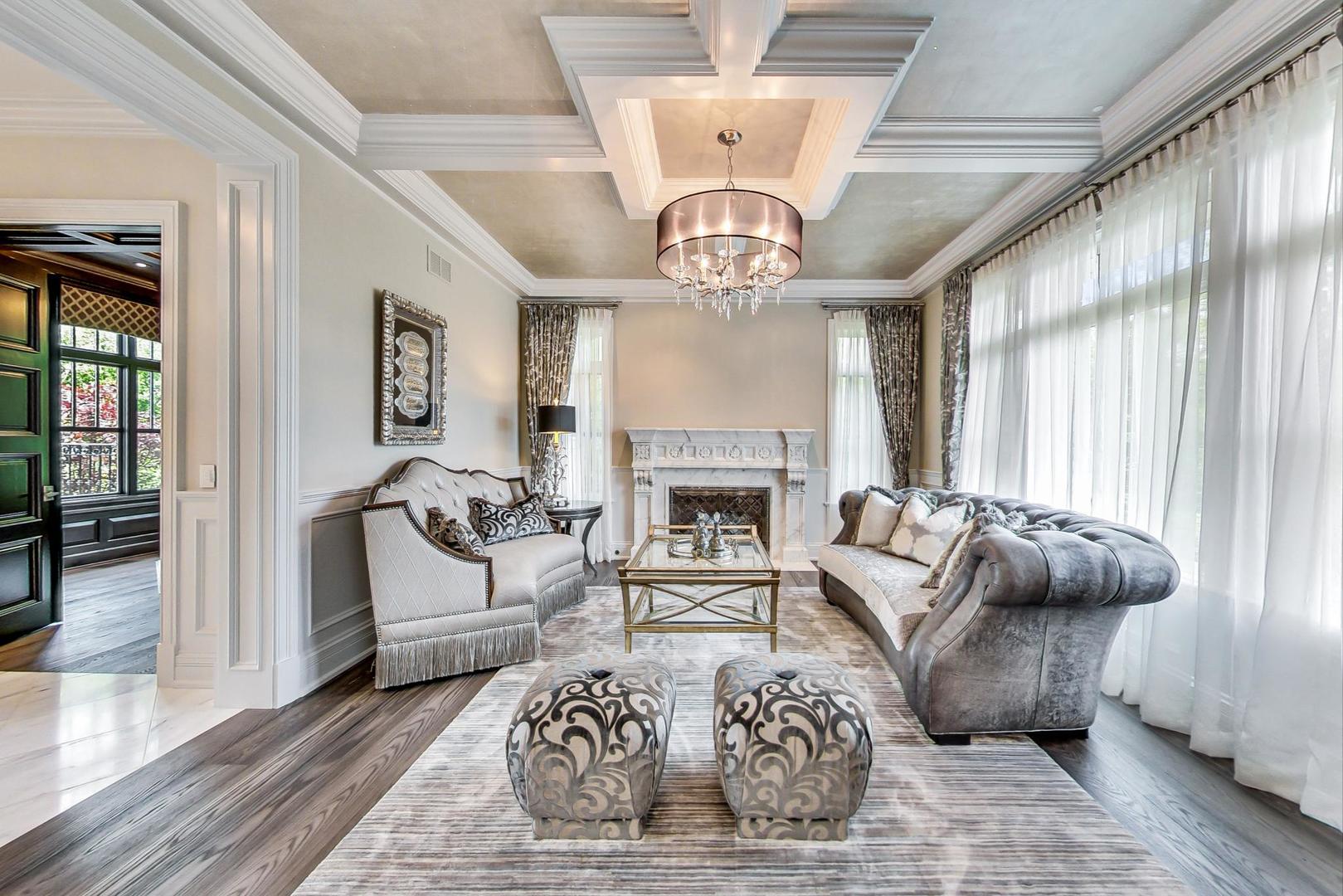 6679 Lee Court Burr Ridge, IL 60527 - Photo 8 of 98 a living room with furniture and a chandelier