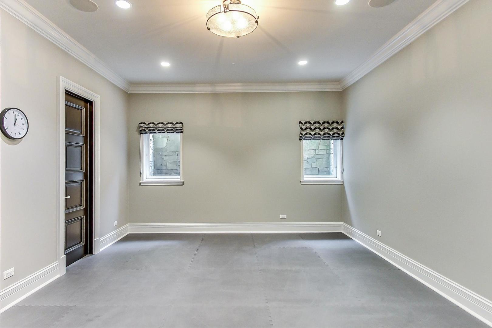 6679 Lee Court Burr Ridge, IL 60527 - Photo 73 of 98 wooden floor in an empty room with a window