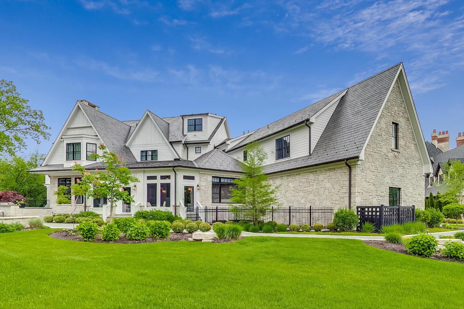 6679 Lee Court Burr Ridge, IL 60527 - Photo 86 of 98 a front view of a house with a garden and yard