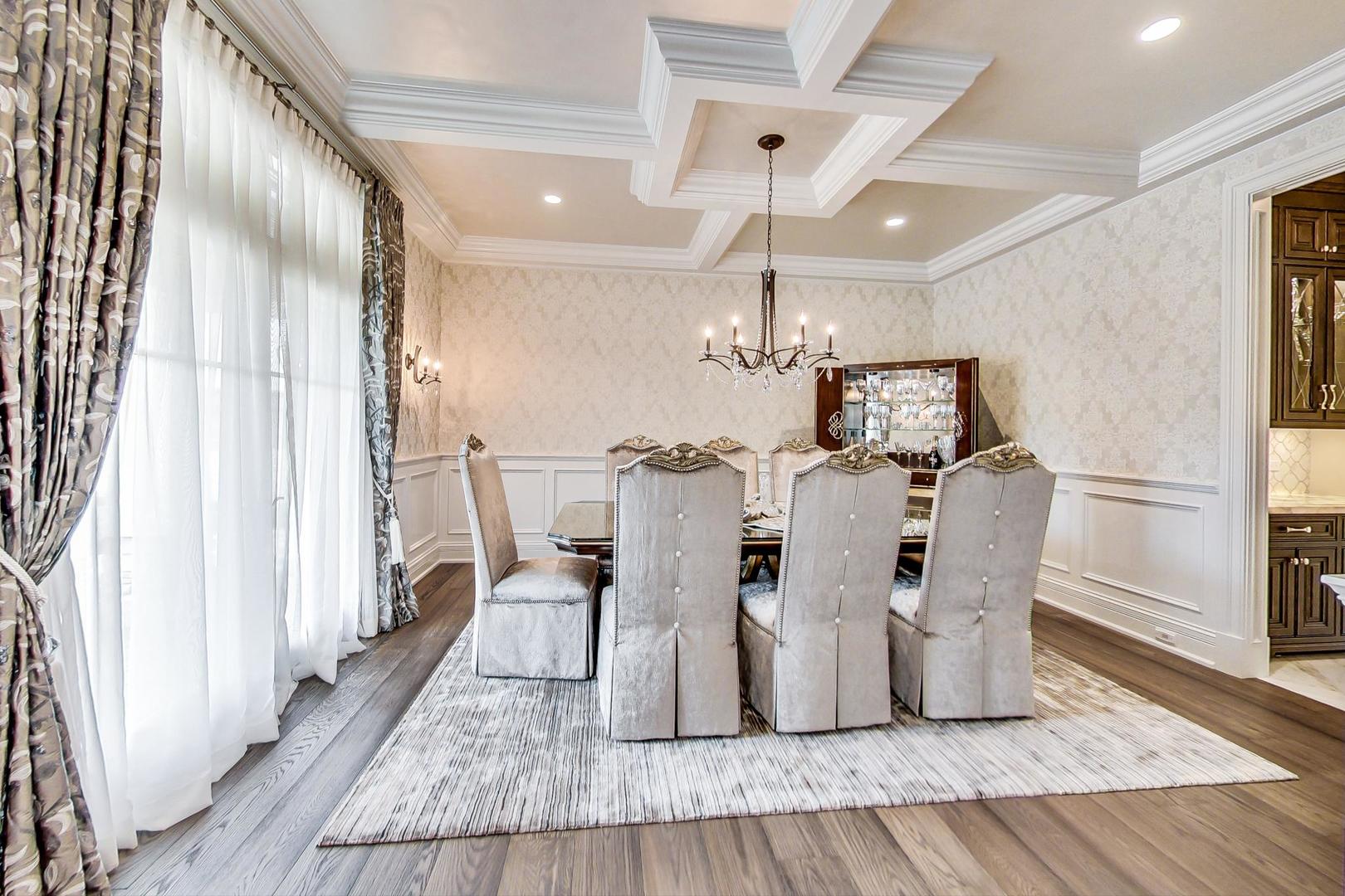 6679 Lee Court Burr Ridge, IL 60527 - Photo 10 of 98 a view of a dining room with furniture and wooden floor