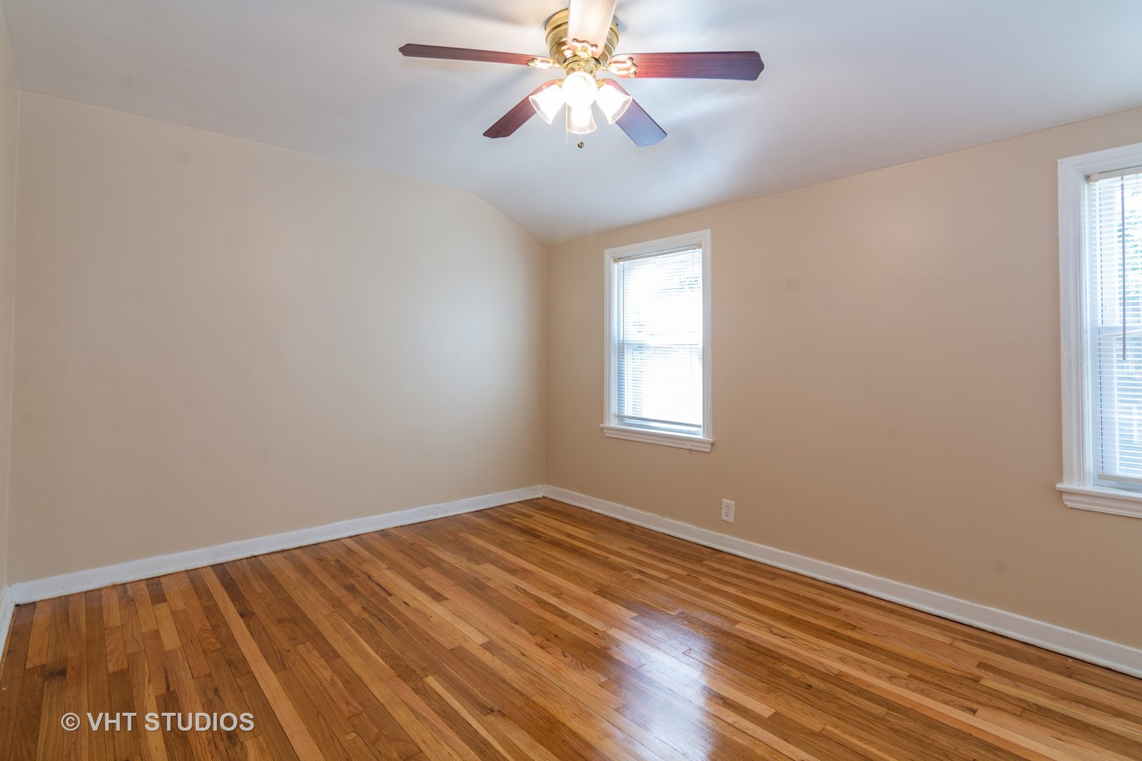 2510 East 96th Street Chicago, IL 60617 - Photo 9 of 13 a view of room with window and ceiling fan