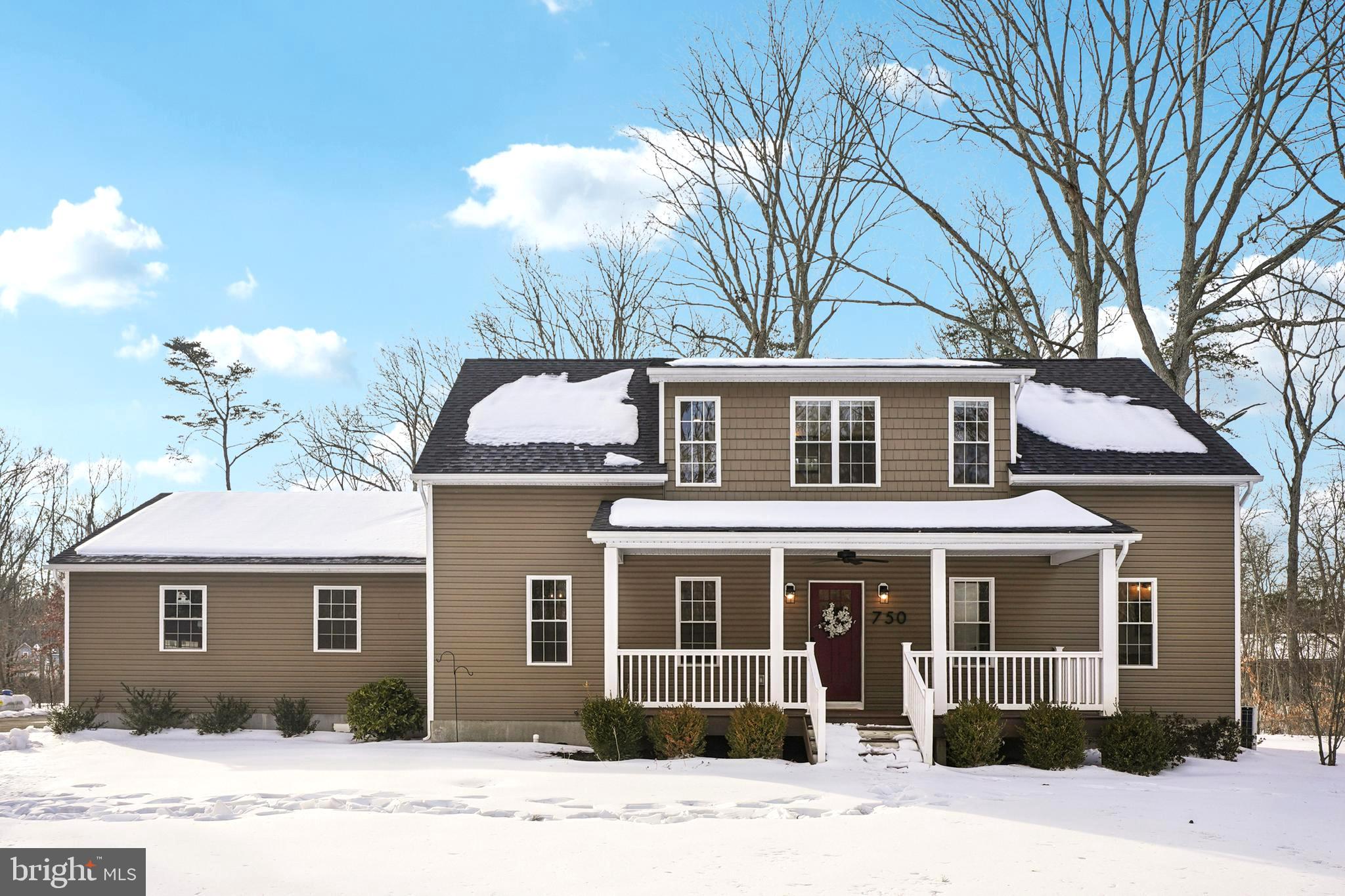 750 Maple Avenue Southampton, NJ 08088 - Photo 1 of 52 a front view of a house with a yard