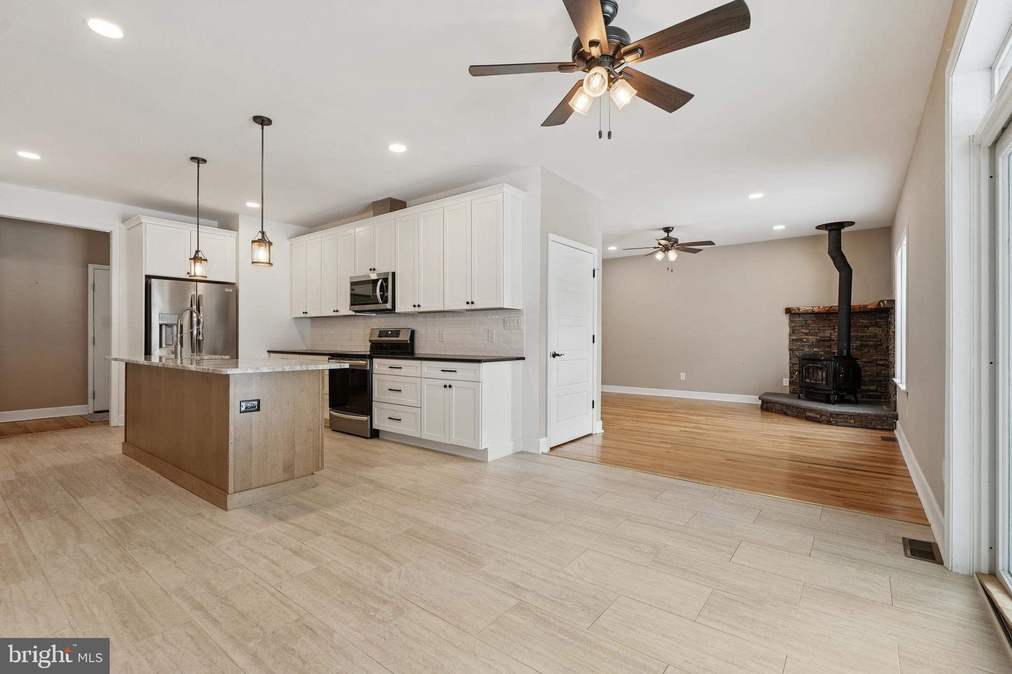 750 Maple Avenue Southampton, NJ 08088 - Photo 11 of 52 a large kitchen with cabinets a sink and stainless steel appliances