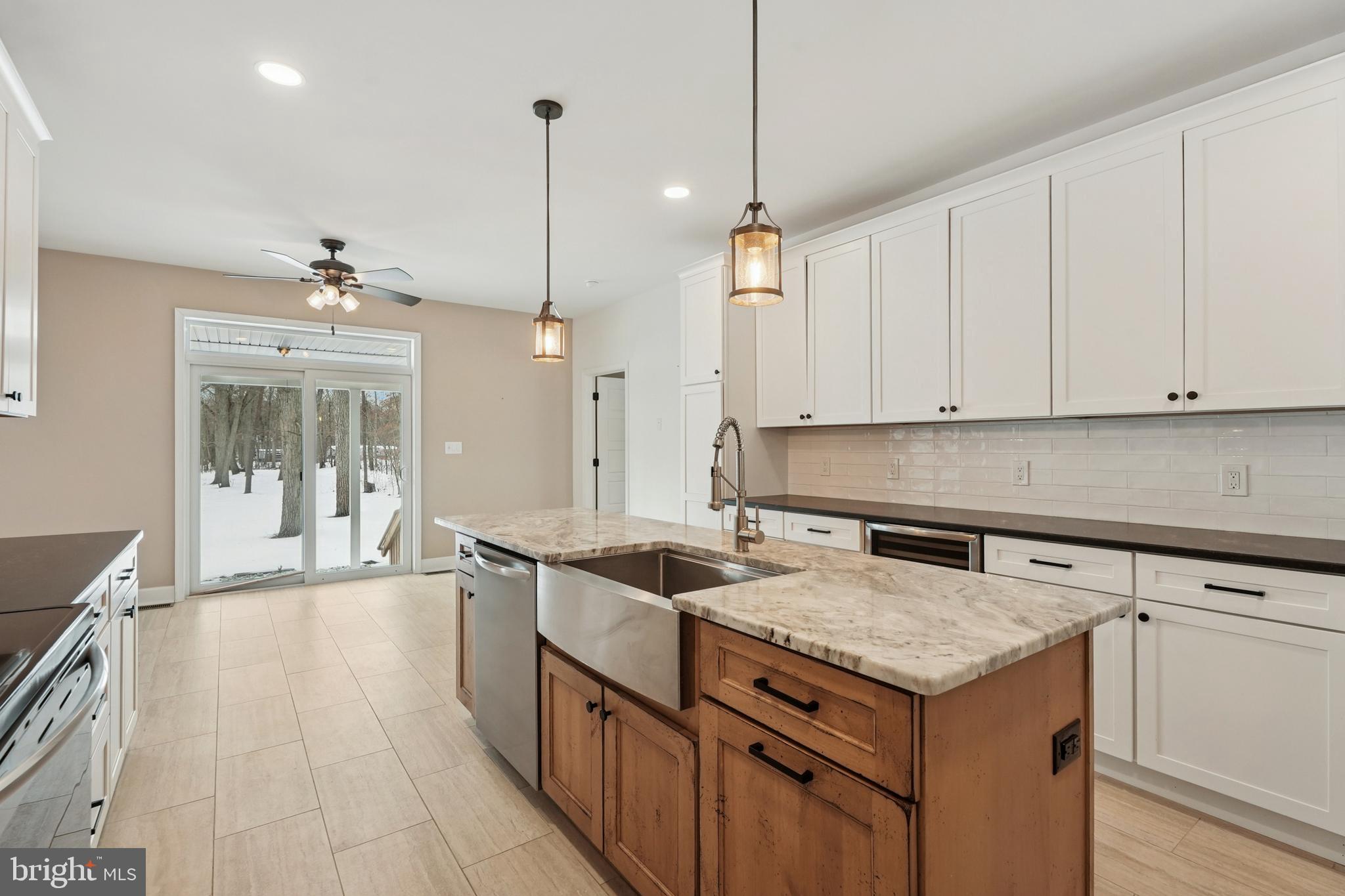 750 Maple Avenue Southampton, NJ 08088 - Photo 12 of 52 a kitchen with a sink and cabinets