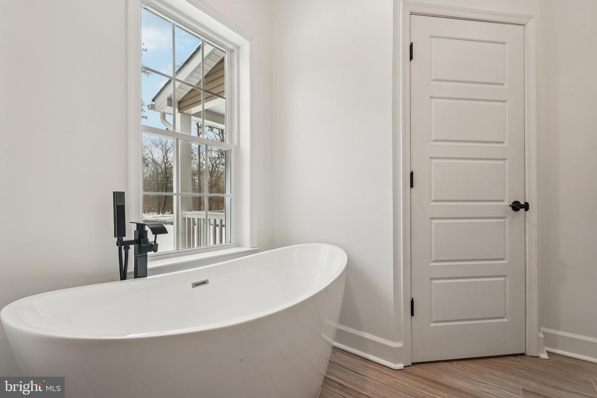 750 Maple Avenue Southampton, NJ 08088 - Photo 20 of 52 a white bath tub sitting next to a window