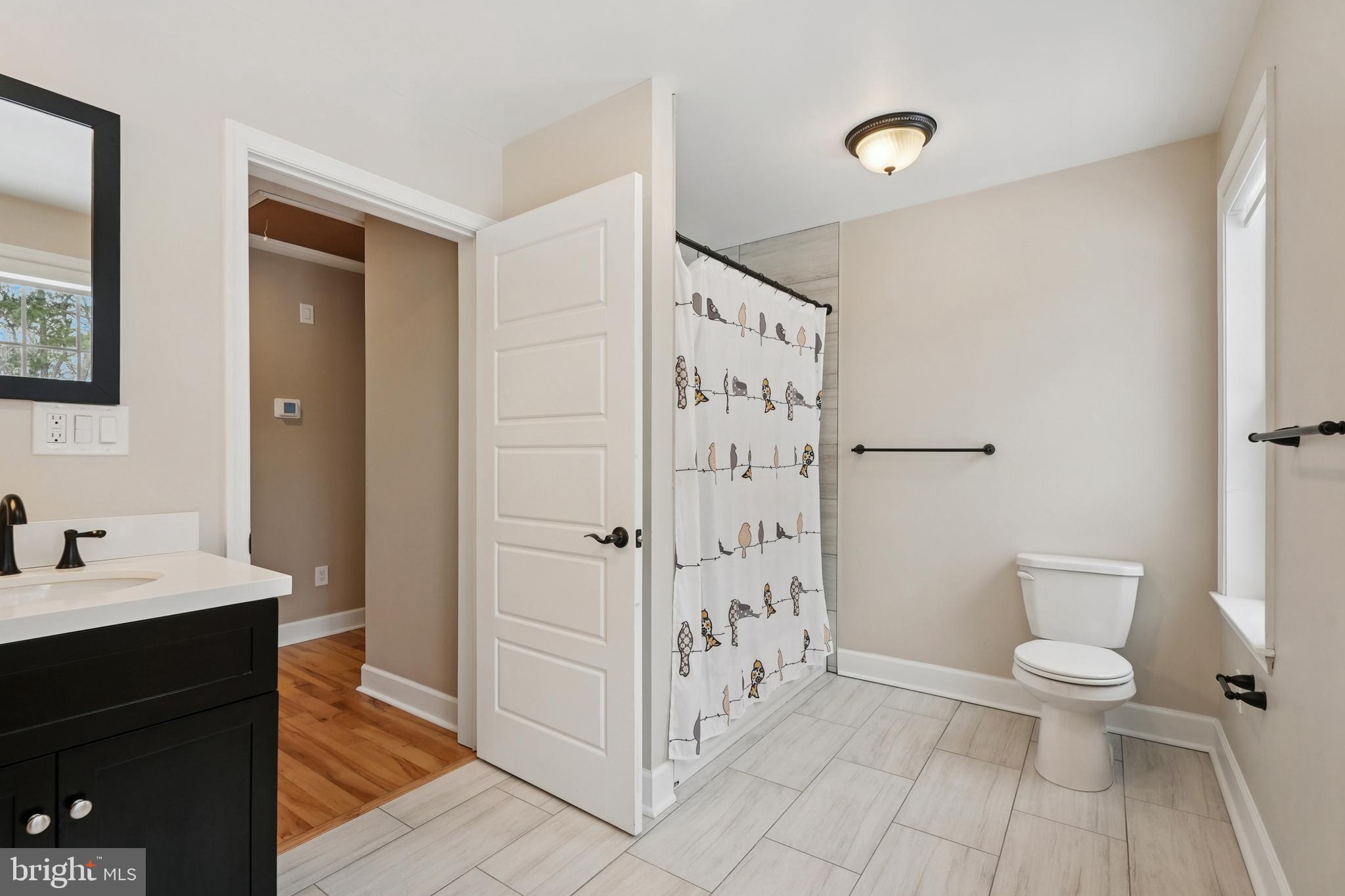 750 Maple Avenue Southampton, NJ 08088 - Photo 26 of 52 a bathroom with a toilet sink and shower