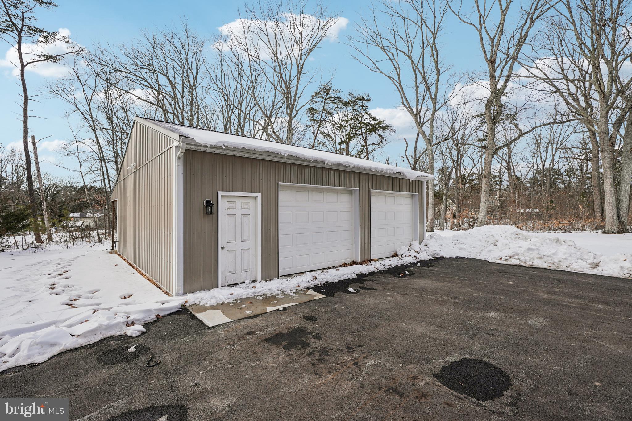 750 Maple Avenue Southampton, NJ 08088 - Photo 45 of 52 a view of garage yard and tree