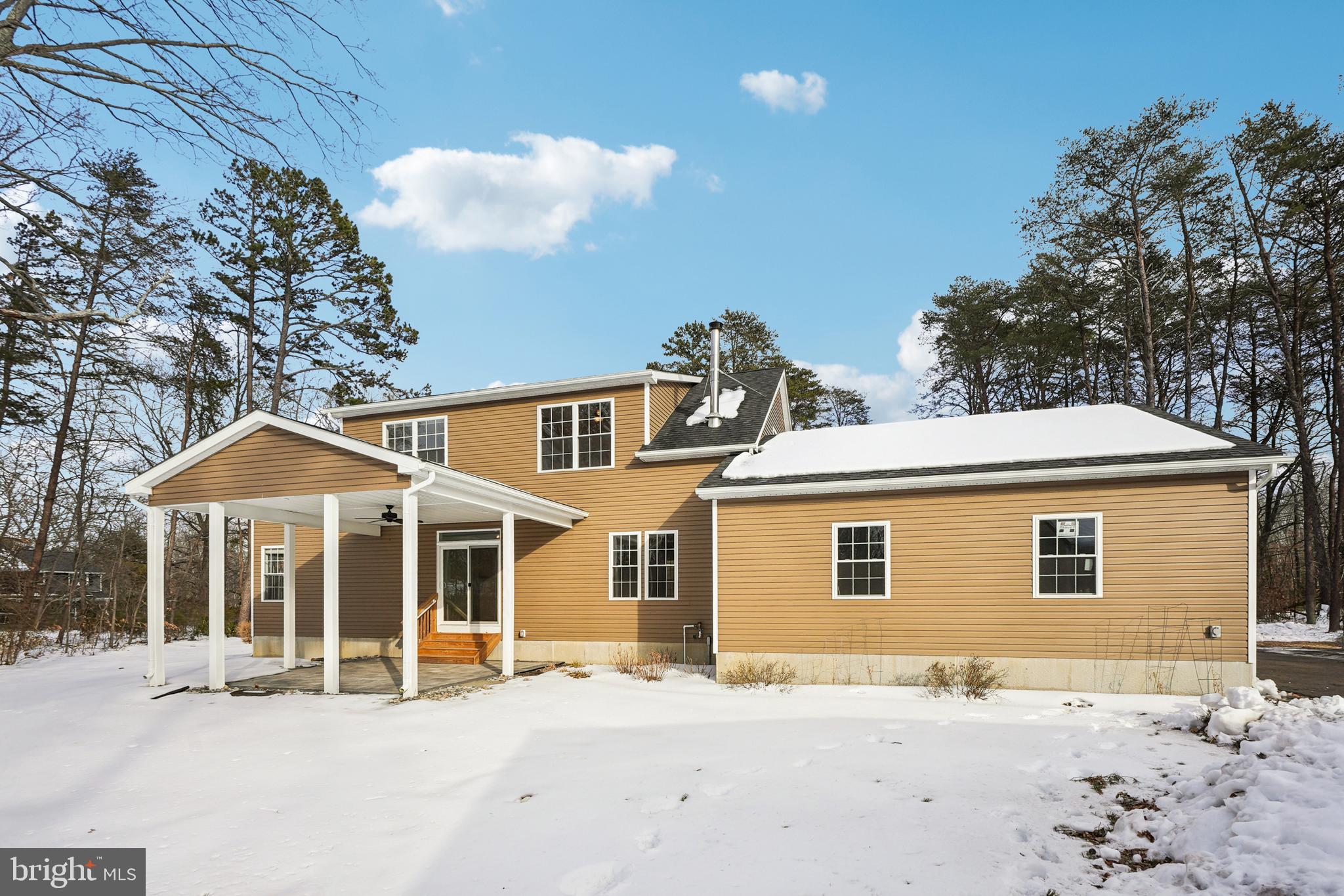 750 Maple Avenue Southampton, NJ 08088 - Photo 48 of 52 a front view of a house with a yard
