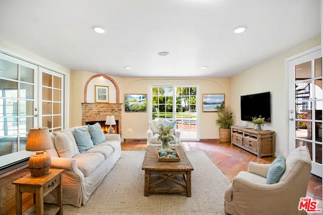 a view of a dining table and chairs in the patio