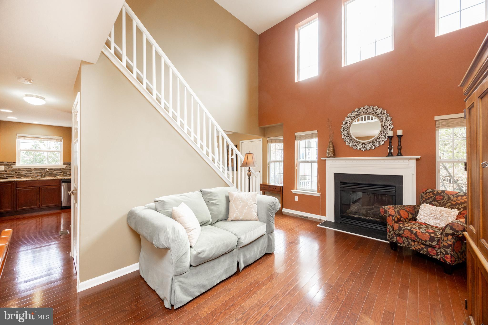19 Granite Lane, Unit 4 Chester Springs, PA 19425 - Photo 11 of 45 a living room with furniture and a fireplace