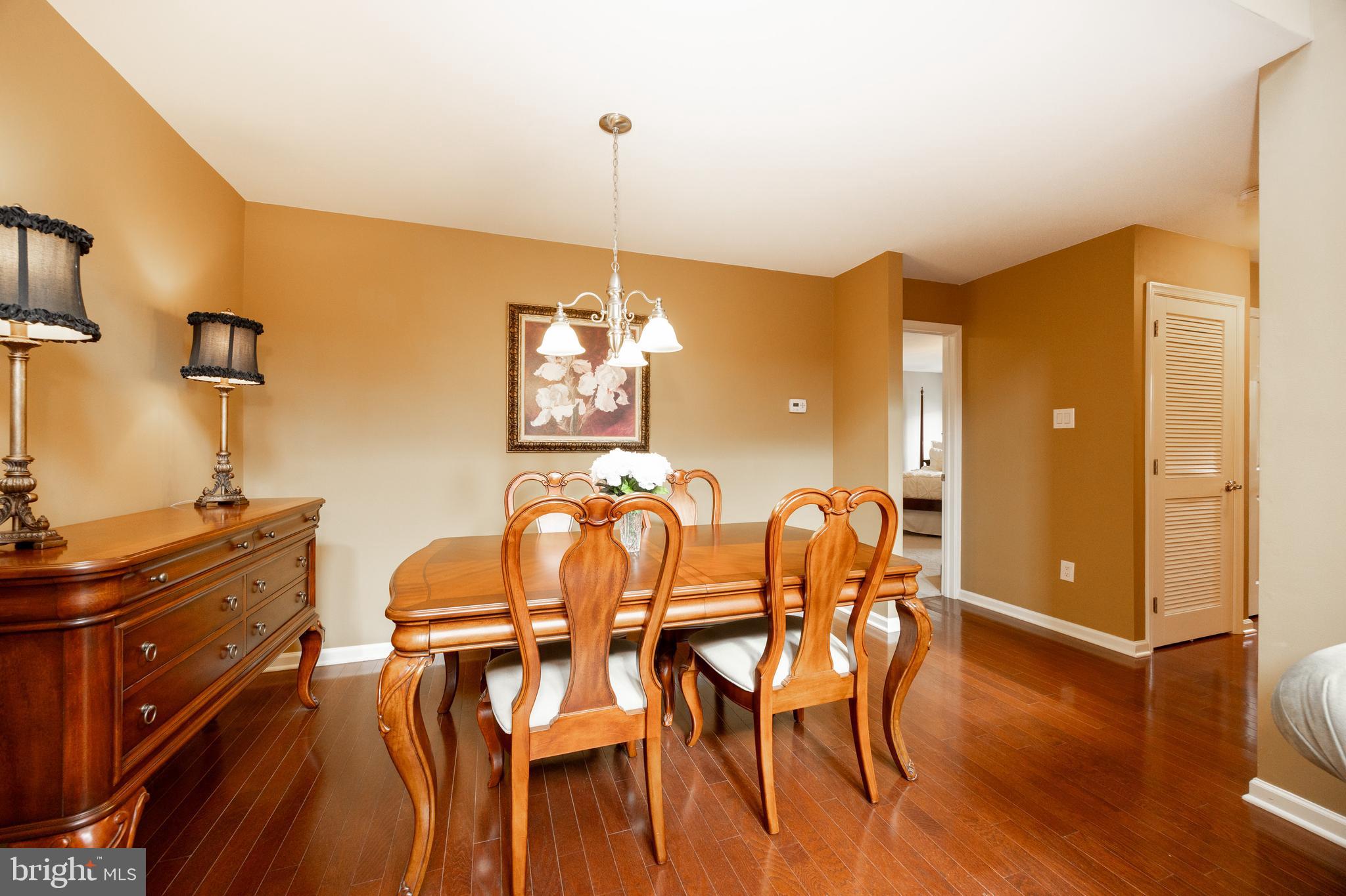 19 Granite Lane, Unit 4 Chester Springs, PA 19425 - Photo 13 of 45 a dining room with furniture and wooden floor