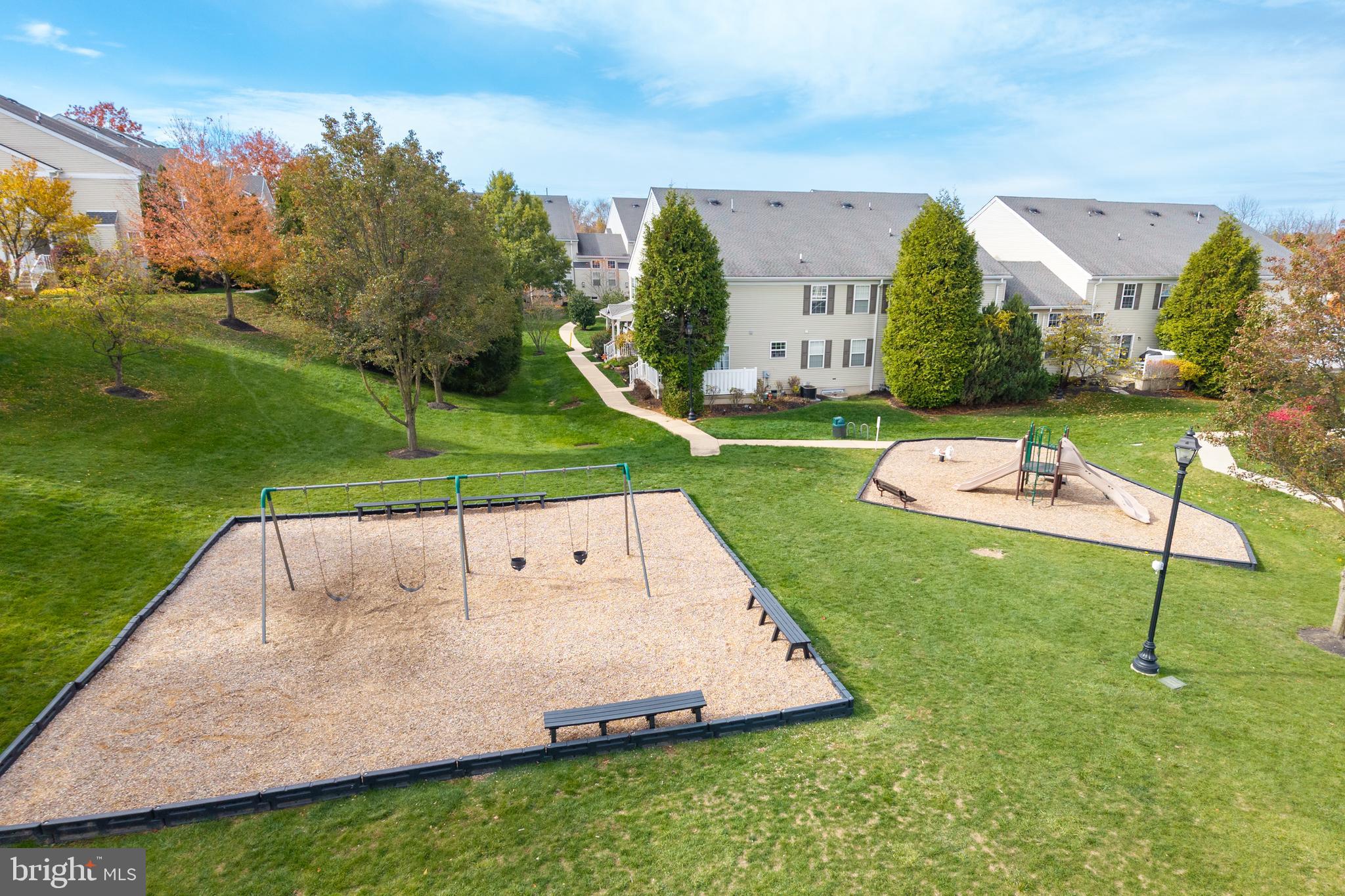 19 Granite Lane, Unit 4 Chester Springs, PA 19425 - Photo 43 of 45 an aerial view of a house with swimming pool garden and outdoor seating
