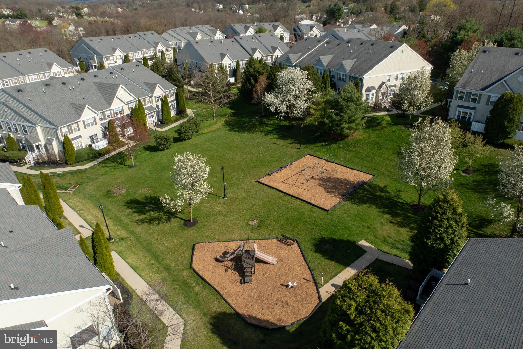 19 Granite Lane, Unit 4 Chester Springs, PA 19425 - Photo 45 of 45 an aerial view of a house with garden space and street view