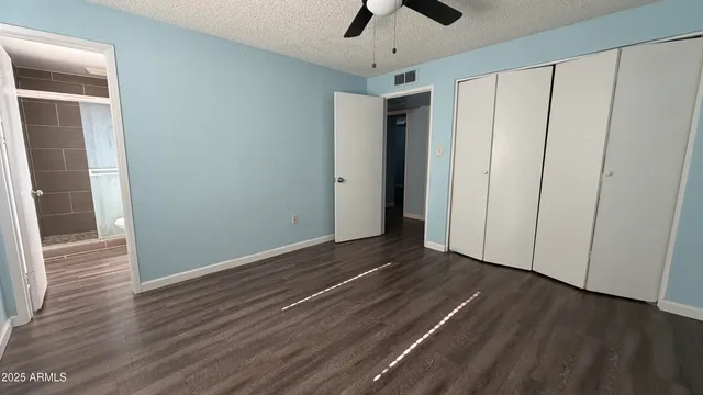 a view of a livingroom with wooden floor