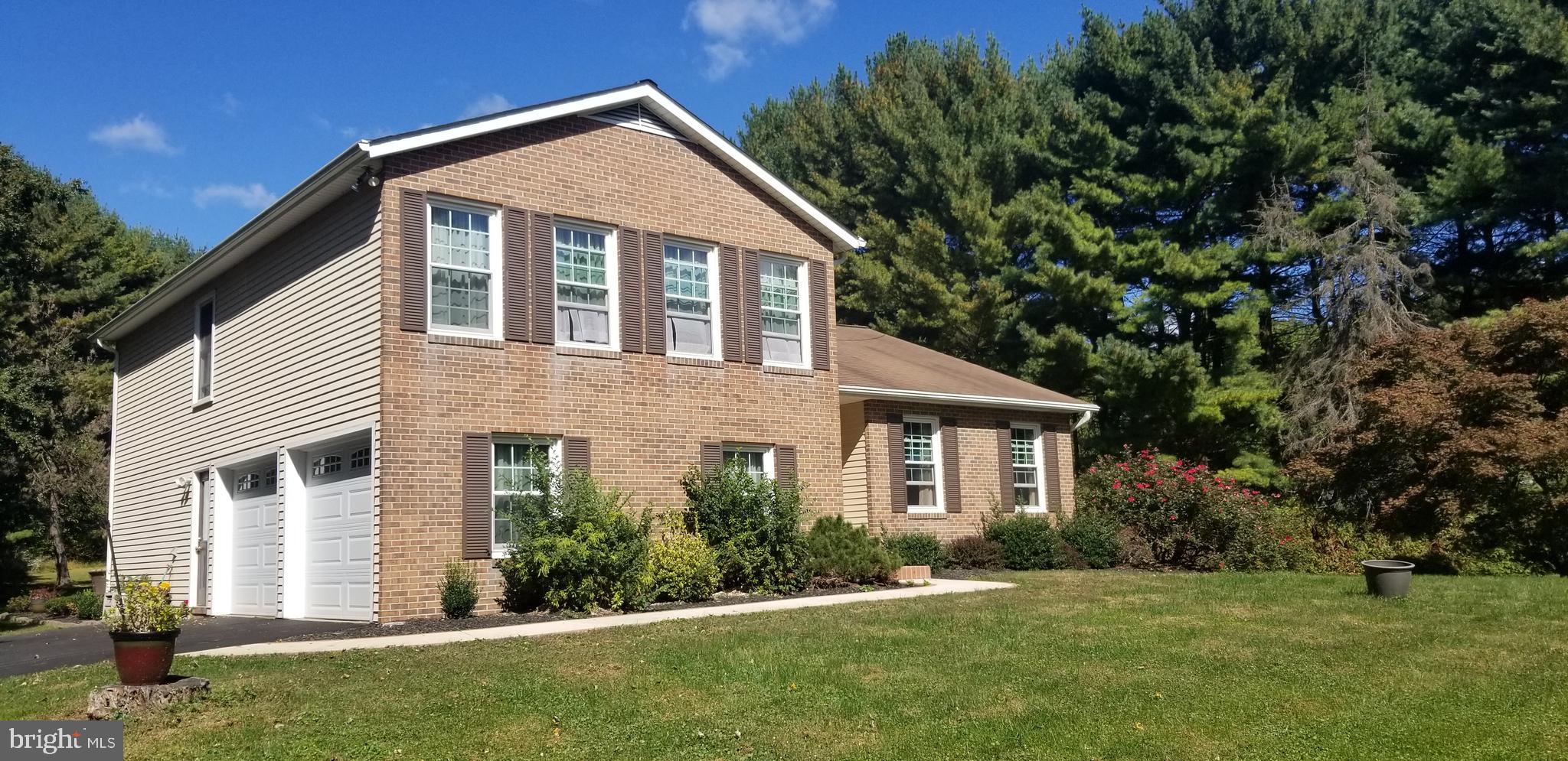 2508 Braddock Road Mount Airy, MD 21771 - Photo 1 of 30 Brick split level home with garage entry off main.