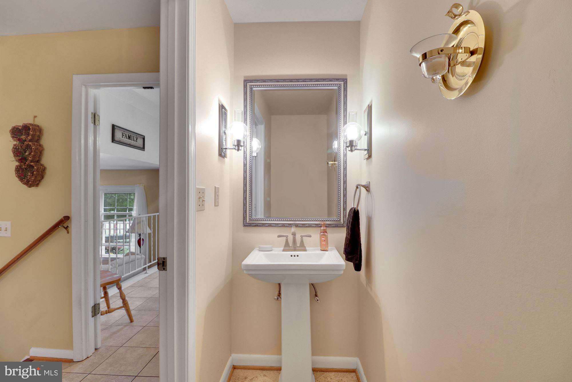 2508 Braddock Road Mount Airy, MD 21771 - Photo 12 of 30 Main level half bathroom off hallway.
