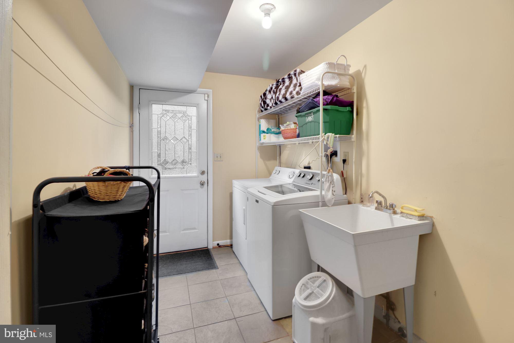 2508 Braddock Road Mount Airy, MD 21771 - Photo 13 of 30 Main level laundry room with exit to driveway.