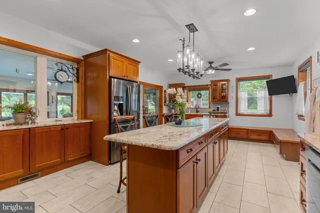 a kitchen with stainless steel appliances granite countertop counter space a sink cabinets and appliances