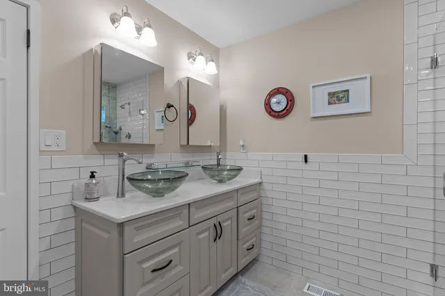 a view of a hallway with seating area