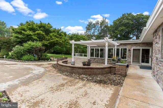 a view of outdoor space with playground and green space