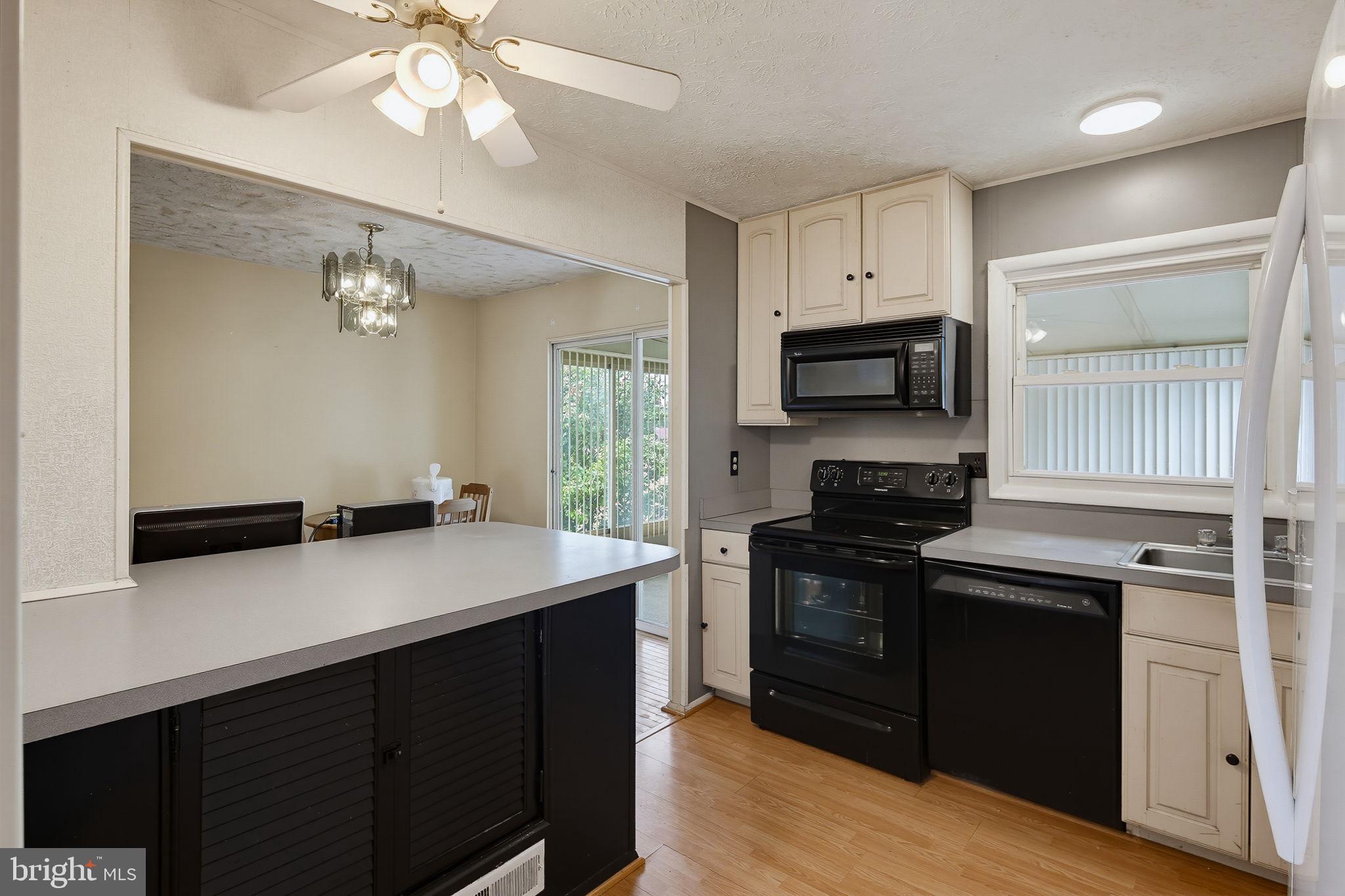 7802 Bastille Road Severn, MD 21144 - Photo 9 of 34 Modern kitchen with sleek finishes.