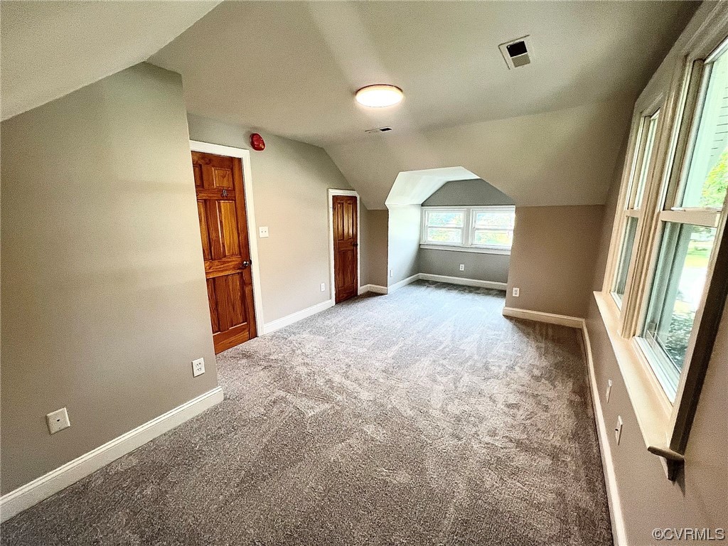 4600 Centralia Road Chester, VA 23831 - Photo 21 of 32 Bonus room featuring vaulted ceiling and light carpet