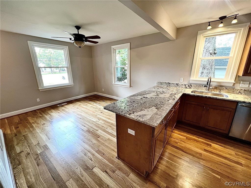 4600 Centralia Road Chester, VA 23831 - Photo 7 of 32 Kitchen featuring ceiling fan, light hardwood floors, and stainless steel dishwasher