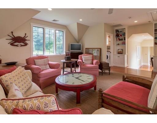 204 Nashawtuc Road Concord, MA 01742 - Photo 12 of 30 a living room with furniture a rug and a large window