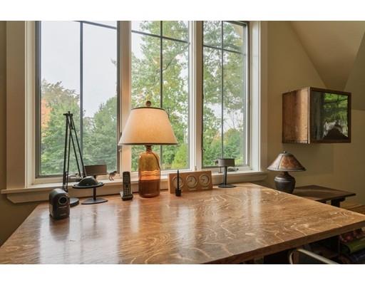 204 Nashawtuc Road Concord, MA 01742 - Photo 13 of 30 a kitchen with a large window and a view of living room