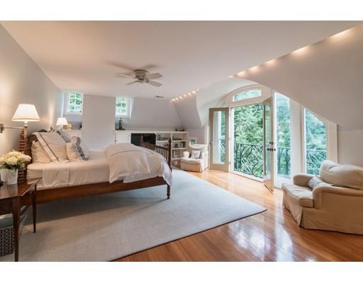 204 Nashawtuc Road Concord, MA 01742 - Photo 14 of 30 a bedroom with a large bed and a large window